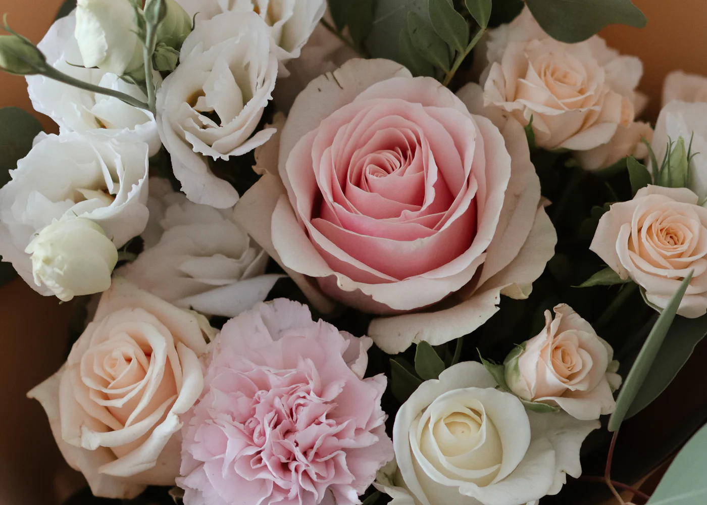 Pink and white roses in a soft bouquet